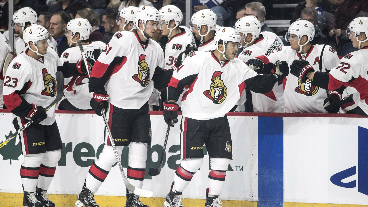 Ottawa-Senators'-Phil-Varone,-right,-Logan-Brown,-centre,-and-Chad-Nehring,-left,-celebrate-a-goal.-(Darren-Calabrese/CP)