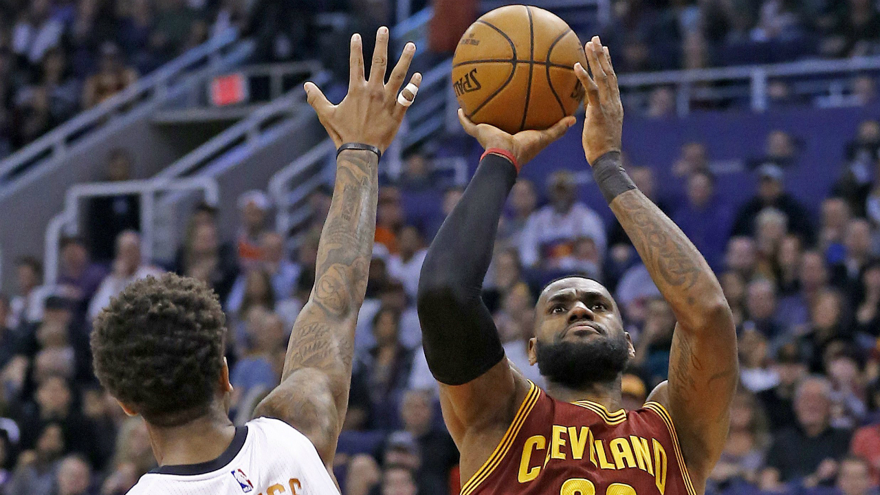 Cleveland-Cavaliers-forward-LeBron-James-(23)-shoots-over-Phoenix-Suns-forward-Marquese-Chriss-(0)-during-the-first-half-of-an-NBA-basketball-game-Sunday,-Jan.-8,-2017,-in-Phoenix.-(Ross-D.-Franklin/AP)