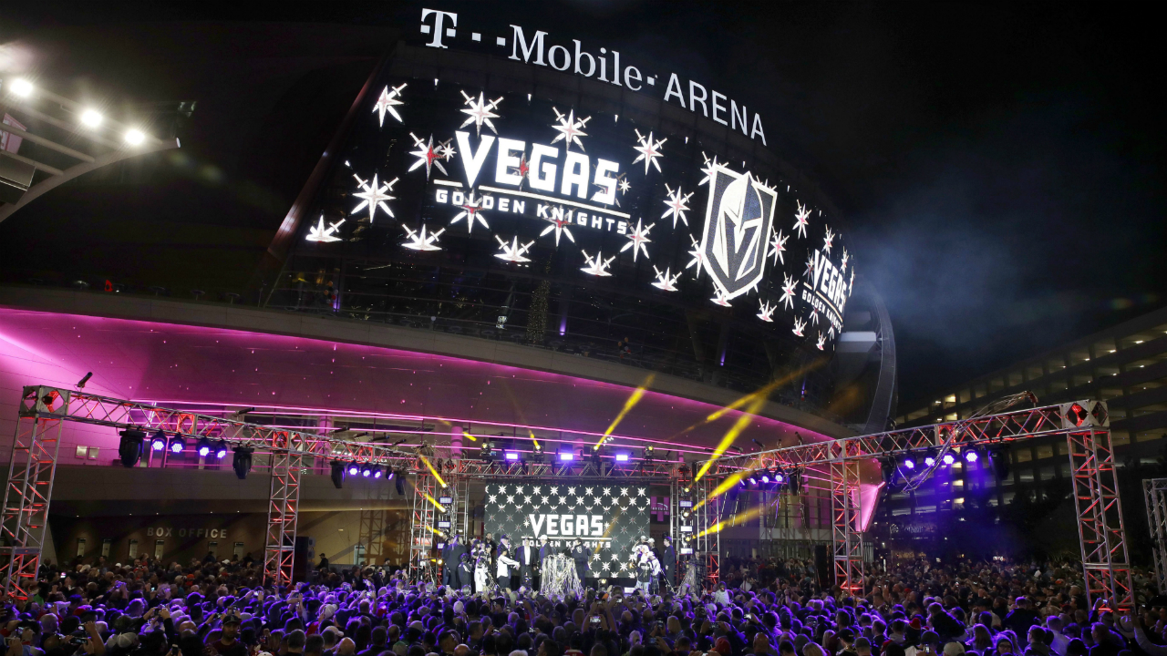 The-team-name-is-displayed-on-a-screen-during-an-event-to-unveil-the-name-of-Las-Vegas'-National-Hockey-League-franchise,-Tuesday,-Nov.-22,-2016,-in-Las-Vegas.-The-team-will-be-called-the-Vegas-Golden-Knights.-(John-Locher/AP)