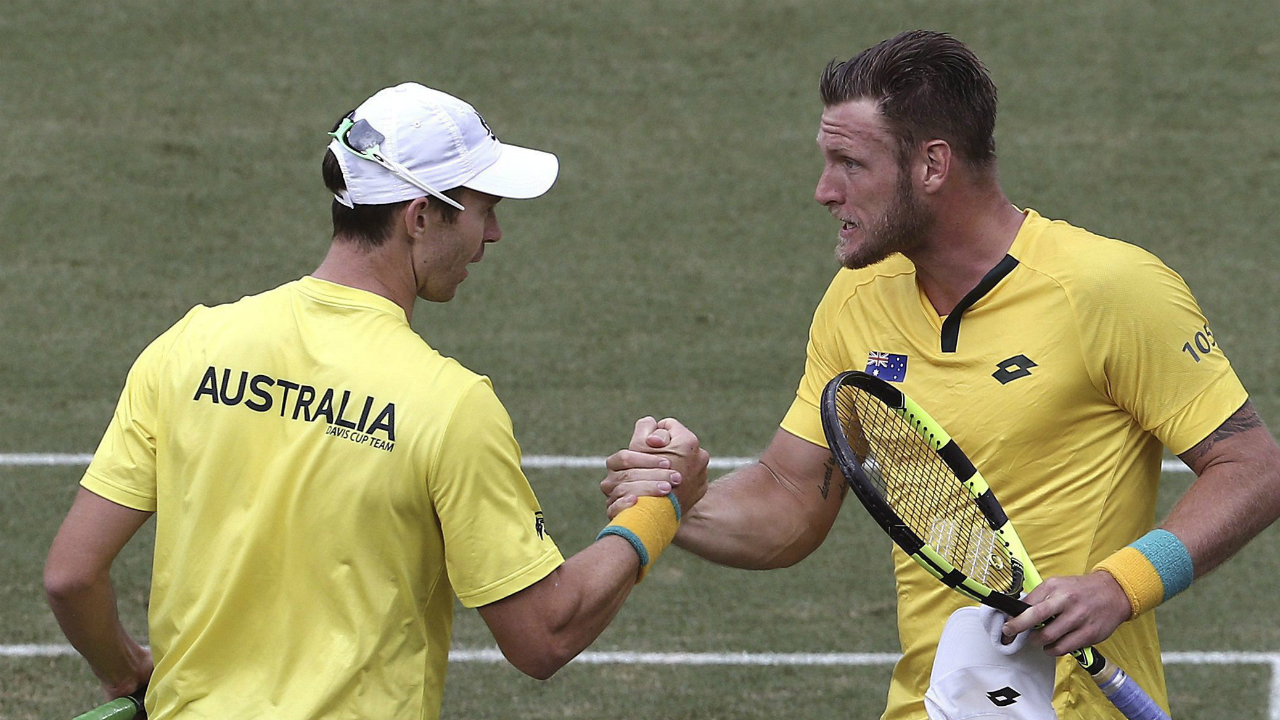 Australia's-Sam-Groth,-right,-and-John-Peers.-(Rob-Griffith/AP)