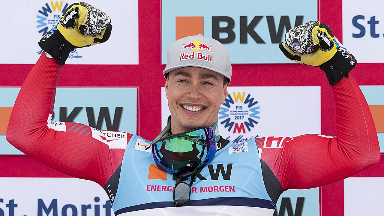 Gold-medallist-Erik-Guay-of-Canada-celebrates-on-the-podium-during-the-winner's-presentation-after-the-men's-Super-G-at-the-2017-Alpine-Skiing-World-Championships-in-St.-Moritz,-Switzerland,-Wednesday,-Feb.-8,-2017.-(Peter-Schneider/Keystone-via-AP)