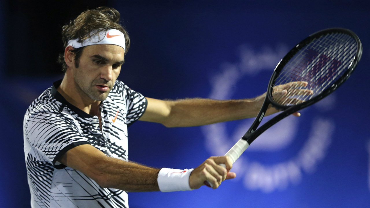 Roger-Federer-of-Switzerland-returns-the-ball-to-Benoit-Paire-of-France-during-the-Dubai-Tennis-Championships-in-Dubai,-United-Arab-Emirates,-Monday,-Feb.-27,-2017.-(Kamran-Jebreili/AP)