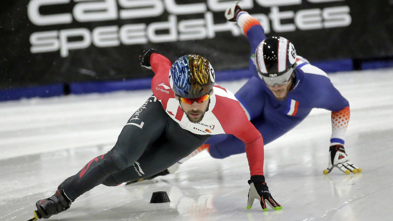 Canada's-Francois-Hamelin,-left,-and-Thibaut-Fauconnet,-of-France,-race-during-the-men's-500-meters-at-a-World-Cup-short-track-speedskating-event-event-Friday,-Nov.-11,-2016,-at-the-Utah-Olympic-Oval,-in-Kearns,-Utah.-(Rick-Bowmer/AP)