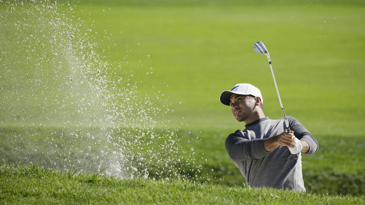 Jason-Day,-of-Australia,-follows-his-shot-out-of-a-bunker-up-to-the-12th-green-of-the-Pebble-Beach-Golf-Links-during-the-third-round-of-the-AT&T-Pebble-Beach-National-Pro-Am-golf-tournament-Saturday,-Feb.-11,-2017,-in-Pebble-Beach,-Calif.-(Eric-Risberg/AP)