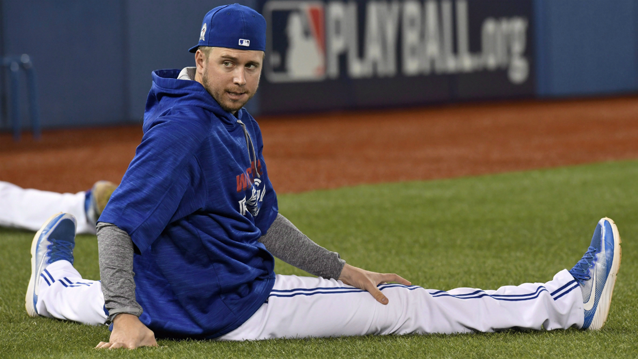 Toronto-Blue-Jays'-Justin-Smoak-stretches-during-batting-practice-in-Toronto-on-Tuesday,-October-11,-2016.-The-Blue-Jays-face-the-Cleveland-Indians-in-the-American-League-Championship-Series-starting-Friday.-(Frank-Gunn/CP)