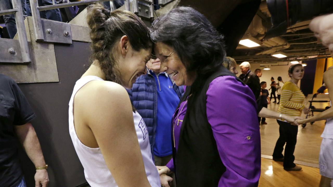 Washington's-Kelsey-Plum,-left,-is-greeted-by-her-mother,-Katie-Plum,-after-the-team's-NCAA-college-basketball-game-against-Utah-on-Saturday,-Feb.-25,-2017,-in-Seattle.-Plum-scored-57-points-and-set-the-all-time-career-NCAA-scoring-record-at-3,397-points-during-the-game.-Washington-won-84-77.-(Elaine-Thompson/AP)