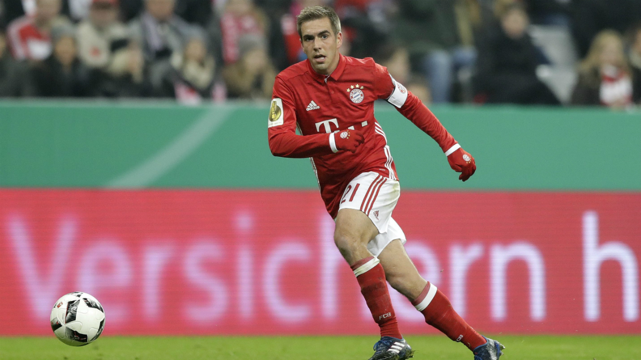 Bayern's-Philipp-Lahm-controls-the-ball-during-the-German-Soccer-Cup-match-between-FC-Bayern-Munich-and-VfL-Wolfsburg-at-the-Allianz-Arena-stadium-in-Munich,-Germany,-Tuesday,-Feb.-7,-2017.-(Matthias-Schrader/AP)