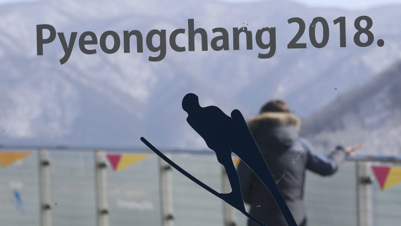 A-woman-stands-at-the-top-of-the-Alpensia-Ski-Jumping-Centre-where-is-the-venue-for-the-Ski-Jumping-and-Nordic-Combined-events-of-the-2108-Pyeongchang-Winter-Games-during-the-media-tour-in-Pyeongchang,-South-Korea,-Friday,-Feb.-10,-2017.-The-opening-ceremony-for-the-Olympic-winter-games-will-be-held-on-Feb.-9,-2018.-(Lee-Jin-man/AP)