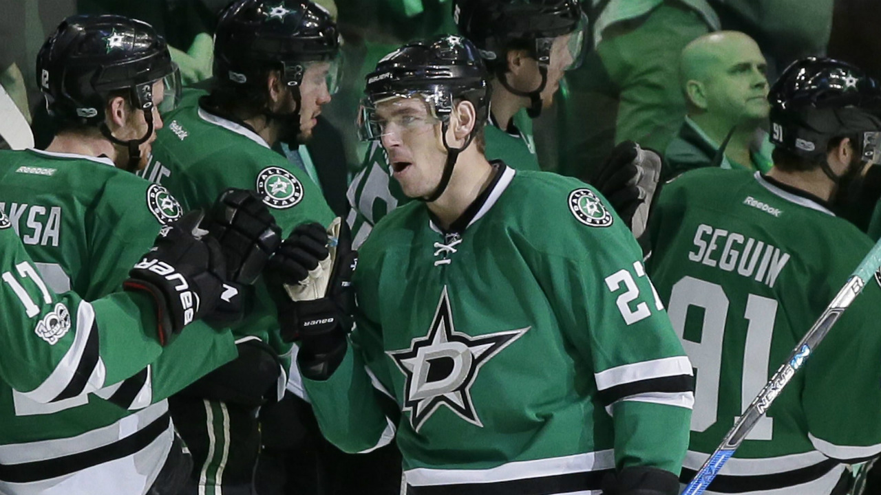 Dallas-Stars-right-wing-Adam-Cracknell-(27)-is-congratulated-after-scoring-a-goal-against-the-San-Jose-Sharks-during-the-second-period-of-an-NHL-hockey-game-in-Dallas,-Friday,-March-24,-2017.-(LM-Otero/AP)