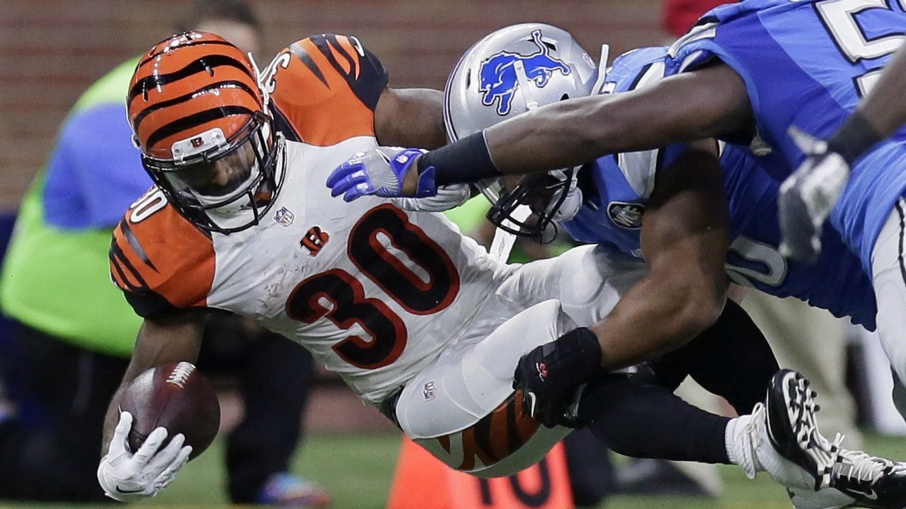 Cincinnati-Bengals-running-back-Cedric-Peerman-(30)-is-brought-down-by-Detroit-Lions-line-backer-Chi-Chi-Ariguzo-in-the-second-half-of-an-NFL-preseason-football-game-in-Detroit,-Thursday,-Aug.-18,-2016.-(Duane-Burleson/AP)