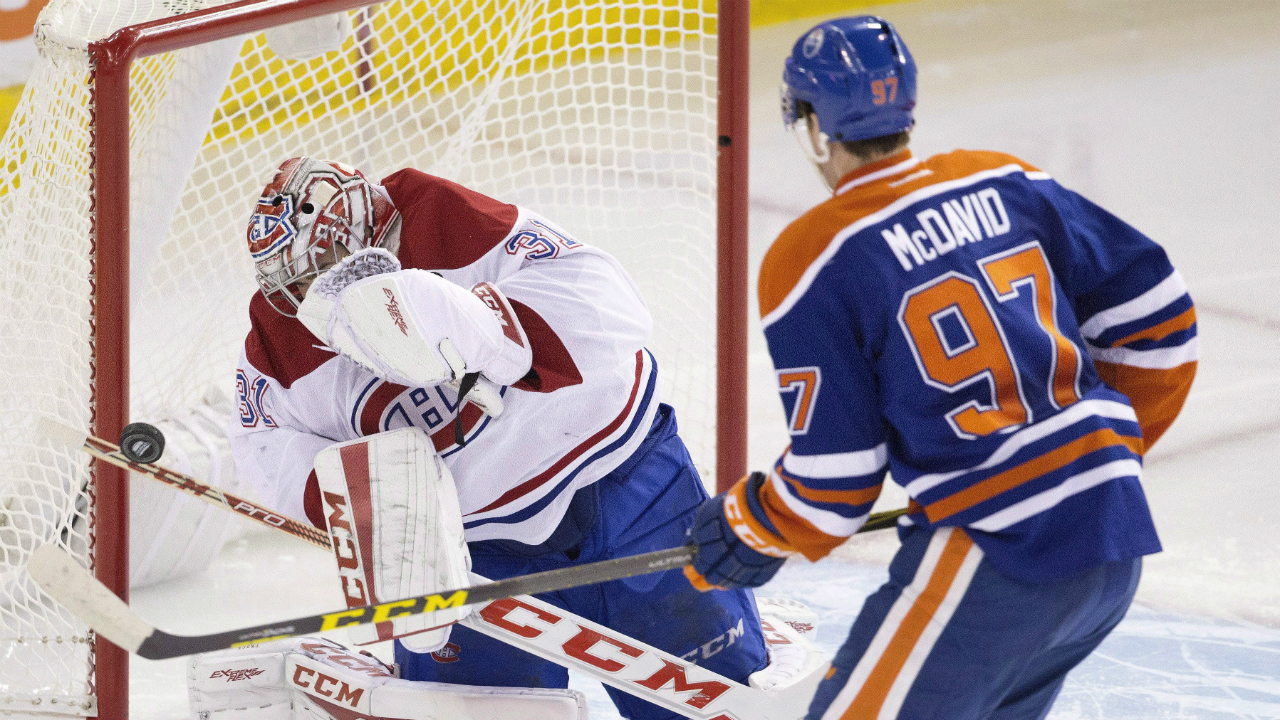 Montreal-Canadiens-goalie-Carey-Price-(31)-makes-the-save-on-Edmonton-Oilers'-Connor-McDavid-(97)-during-second-period-NHL-action-in-Edmonton,-Alta.,-on-Thursday-October-29,-2015.-(Jason-Franson/CP)