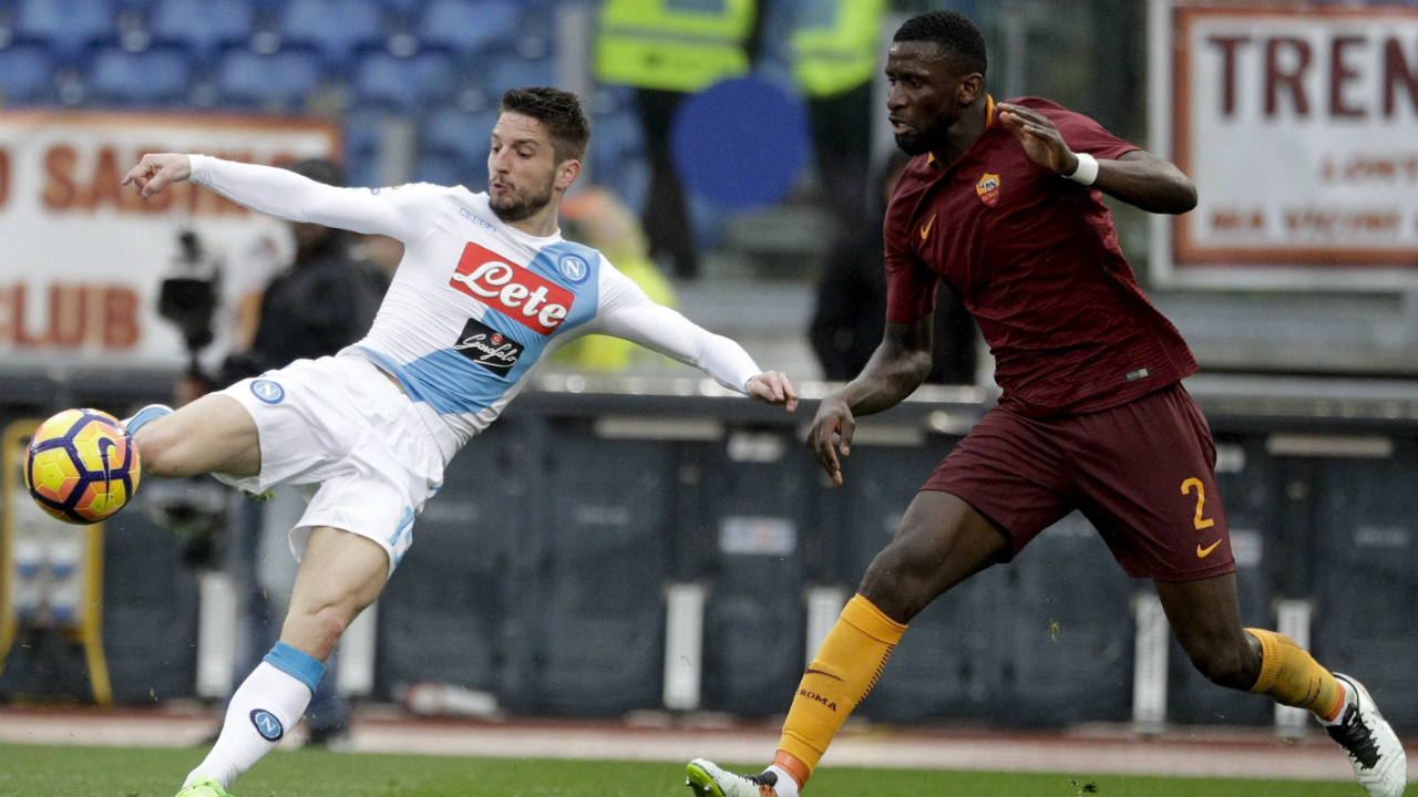 Napoli's-Dries-Mertens,-left,-kicks-the-ball-past-Roma's-Antonio-Rudiger-during-a-Serie-A-soccer-match-between-Roma-and-Napoli,-at-the-Rome-Olympic-stadium,-Saturday,-March-4,-2017.-(Gregorio-Borgia/AP)