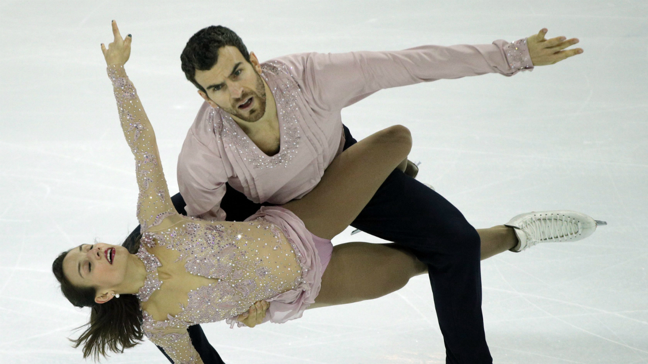 Meagan-Duhamel-and-Eric-Radford-of-Canada-compete-in-the-Pairs-Free-Skating-Program-during-ISU-Grand-Prix-of-Figure-Skating-Final-in-Marseille,-southern-France,-Friday,-Dec.-9,-2016.-(Christophe-Ena/AP)