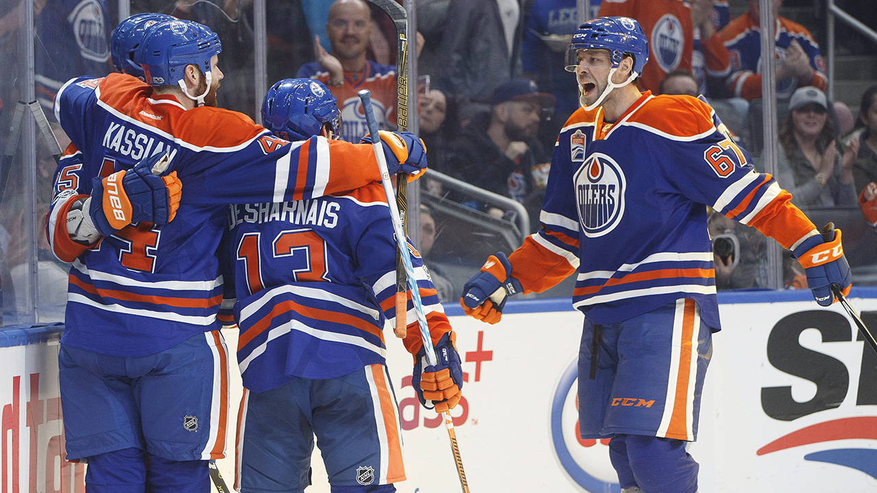 Edmonton-Oilers'-Zack-Kassian-(44),-David-Desharnais-(13)-and-Benoit-Pouliot-(67)-celebrate-a-goal-against-the-Dallas-Stars-during-second-period-NHL-action-in-Edmonton,-Alta.,-on-Tuesday,-March-14,-2017.-(Jason-Franson/CP)