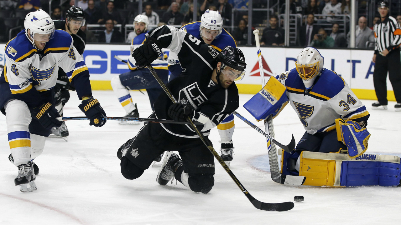 Los-Angeles-Kings-left-wing-Andy-Andreoff-(15)-shoots-at-St.-Louis-Blues-goalie-Jake-Allen-(34).-(Alex-Gallardo/AP)