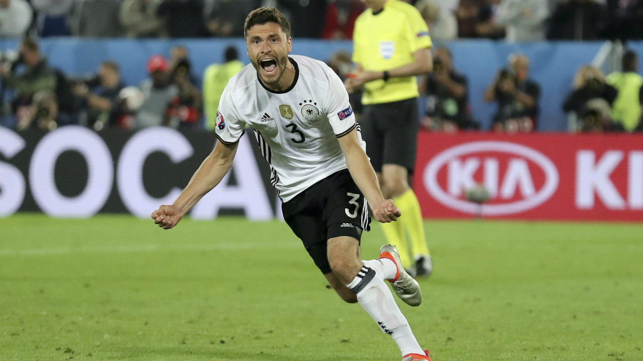 Germany's-Jonas-Hector-celebrates-after-scoring-the-winning-penalty-during-the-Euro-2016-quarterfinal-soccer-match-between-Germany-and-Italy,-at-the-Nouveau-Stade-in-Bordeaux,-France,-Saturday,-July-2,-2016.-Germany-beat-Italy-6-5-in-a-penalty-shootout.-(Antonio-Calanni/AP)