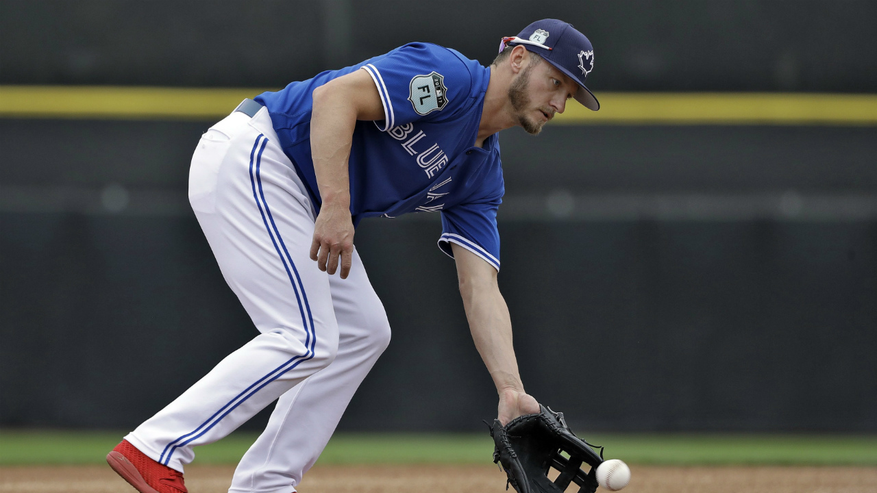 Toronto-Blue-Jays-third-baseman-Josh-Donaldson-picks-up-a-ground-ball-during-infield-drills-before-a-spring-training-baseball-game-against-the-Boston-Red-Sox-Monday,-March-13,-2017,-in-Dunedin,-Fla.-(Chris-O'Meara/AP)