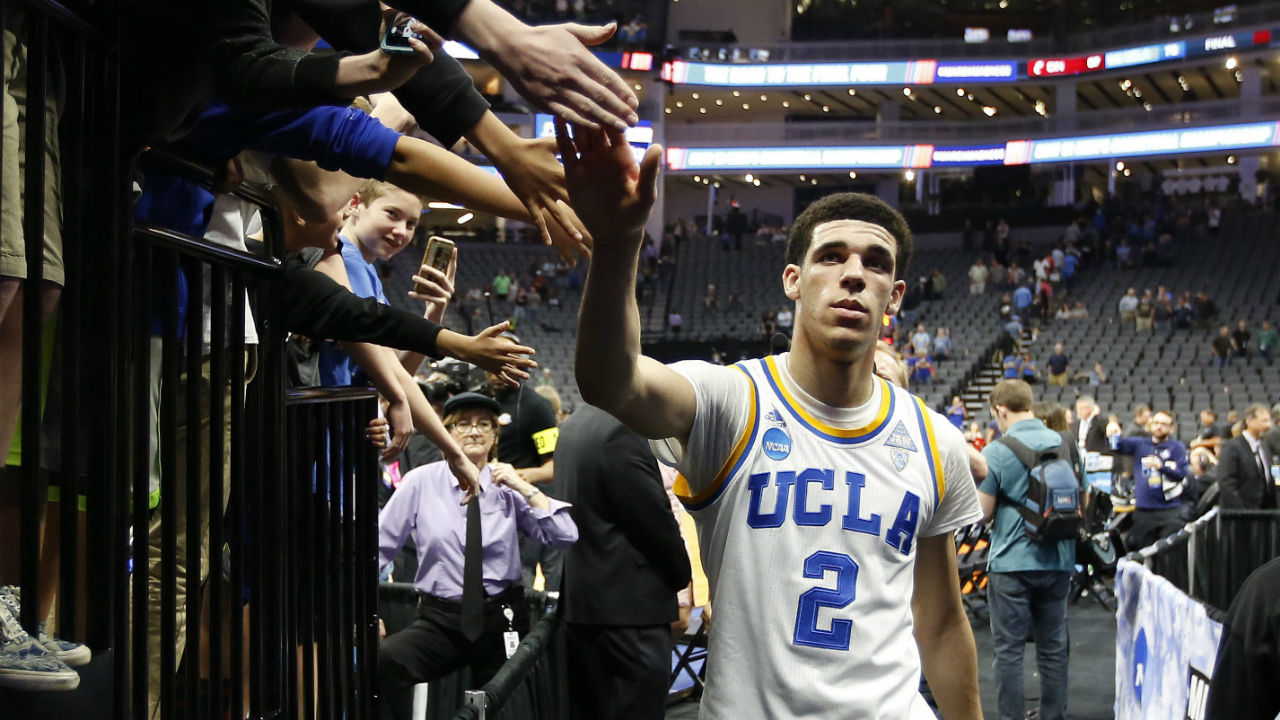 UCLA-Bruins-guard-Lonzo-Ball-slaps-hands-as-he-walks-to-the-locker-room-after-UCLA-beat-Cincinnati-79-67-in-a-second-round-game-of-the-men's-NCAA-college-basketball-tournament-in-Sacramento,-Calif.,-Sunday,-March-19,-2017.-(Rich-Pedroncelli/AP)