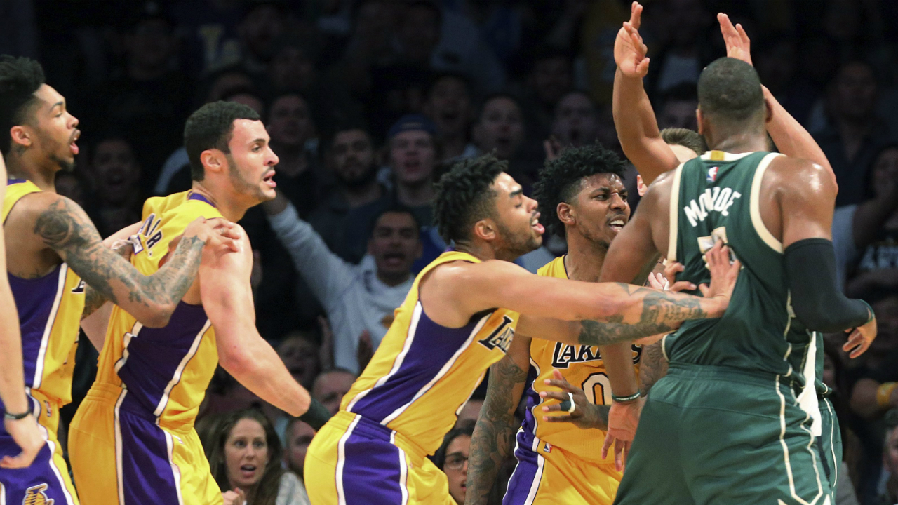 Los-Angeles-Lakers-guard-D'Angelo-Russell-(1)-shoves-Milwaukee-Bucks-center-Greg-Monroe-(15)-as-players-from-both-teams-take-part-in-a-shoving-match-after-Lakers'-Nick-Young-(0),-second-from-right,-took-a-hard-foul-during-the-third-quarter-of-an-NBA-basketball-game-in-Los-Angeleson-Friday,-March-17,-2017.-Three-players-were-ejected.-The-Bucks-won-107-103.-(Reed-Saxon/AP)