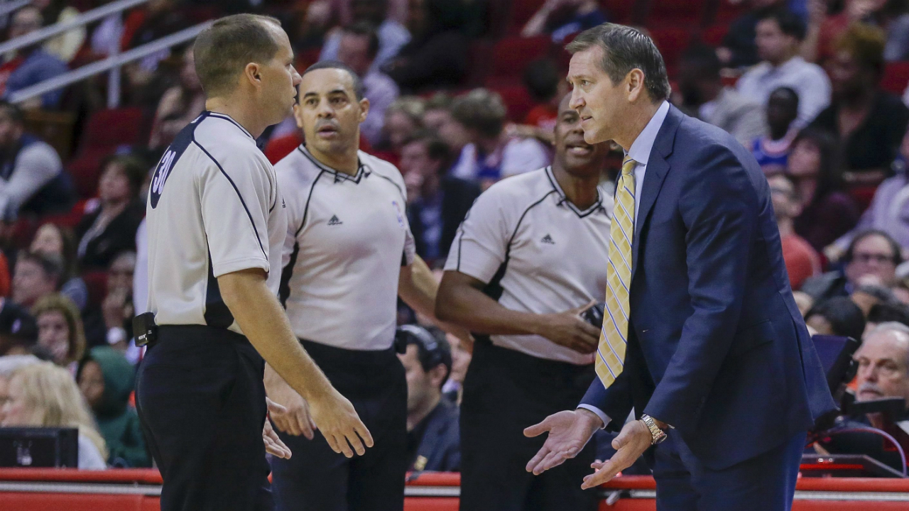 New-York-Knicks-coach-Jeff-Hornacek-argues-with-referee-John-Goble,-left.-(Bob-Level/AP)