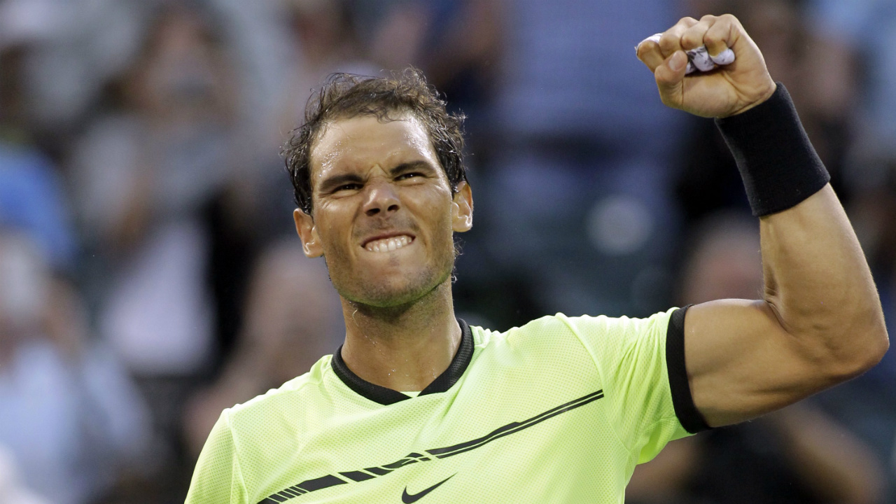 Rafael-Nadal,-of-Spain,-gestures-after-defeating-Dudi-Sela-of-Israel,-during-the-Miami-Open-tennis-tournament,-Friday,-March-24,-2017,-in-Key-Biscayne,-Fla.-(Luis-M.-Alvarez/AP)