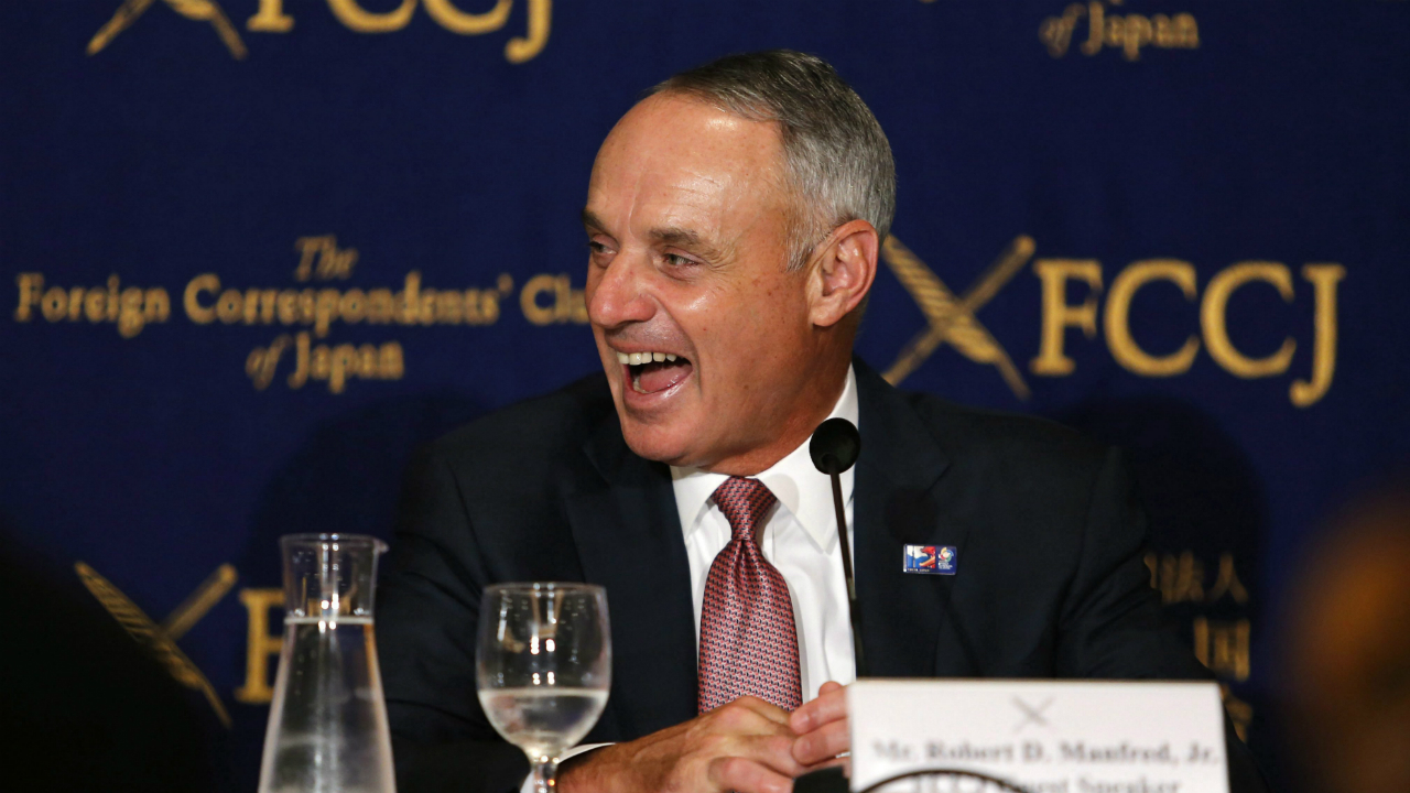 Major-League-Baseball-Commissioner-Rob-Manfred-laughs-during-a-press-conference-in-Tokyo,-Tuesday,-March-7,-2017.-Manfred-denied-reports-Tuesday-that-2017-would-be-the-last-edition-of-the-World-Baseball-Classic,-saying-the-tournament-is-as-popular-as-ever.-The-fourth-edition-of-the-tournament-run-by-MLB-and-the-players'-association-began-in-Seoul-on-Monday.-Japan-will-kick-off-its-campaign-on-Tuesday-against-Cuba-at-Tokyo-Dome.-(Toru-Takahashi/AP)
