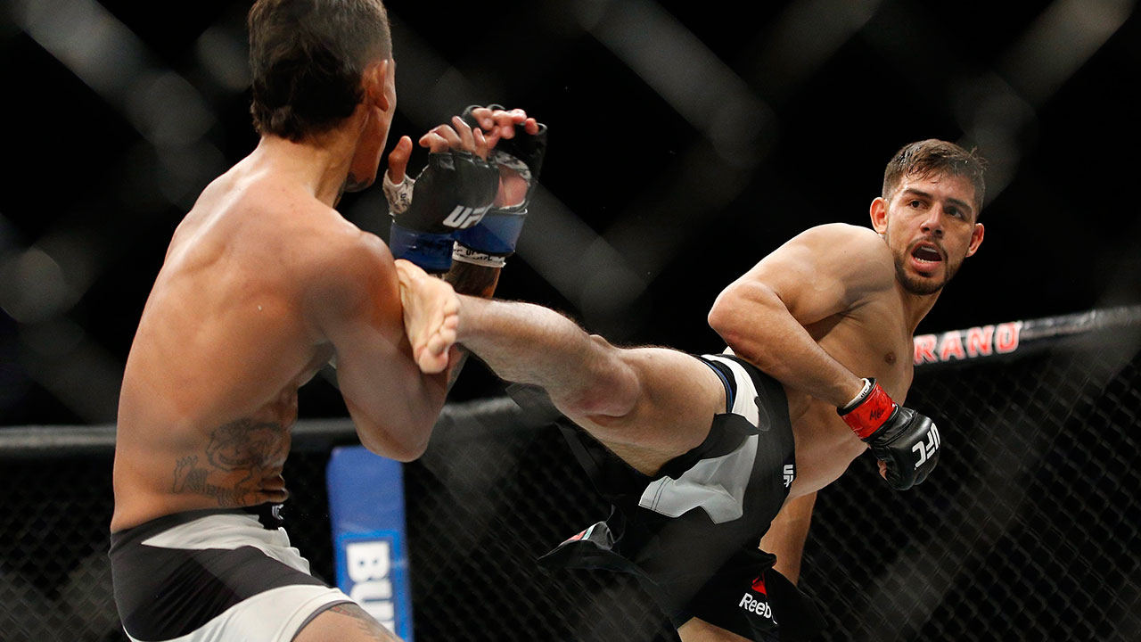Yair-Rodriguez-throws-a-kick-at-Andre-Fili-at-UFC-197.