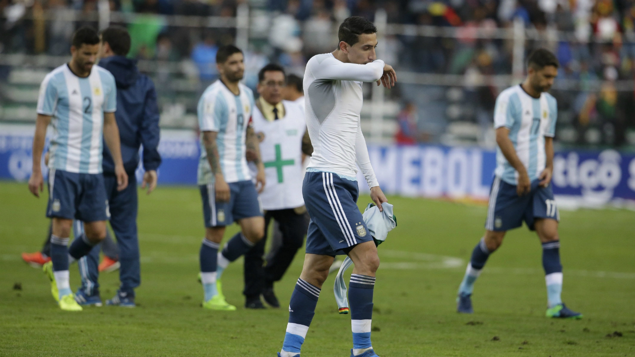 Argentina's-angel-Di-Maria-and-teammates-leave-the-pitch-after-their-0-2-lost-against-Bolivia-in-a-2018-World-Cup-soccer-qualifying-match-in-La-Paz,-Bolivia,-on-Tuesday,-March-28,-2017.-(Victor-R.-Caivano/AP)