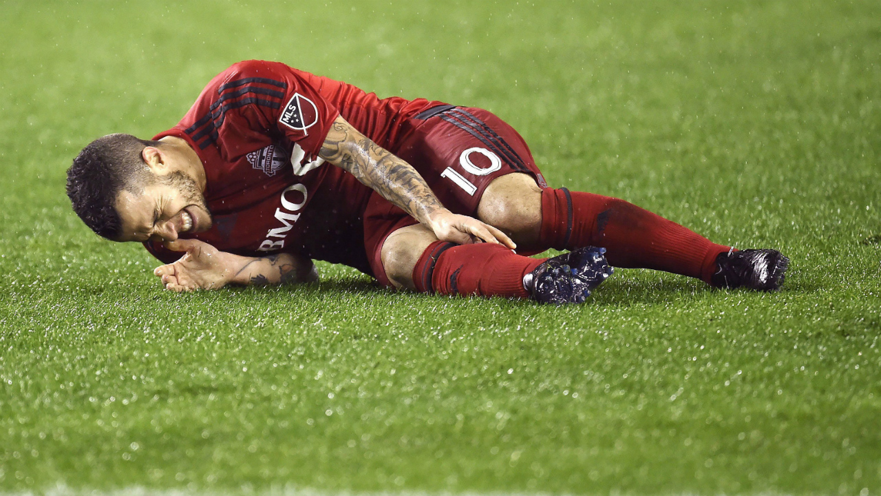 TFC's Sebastian Giovinco in pain after blow to the leg on Saturday