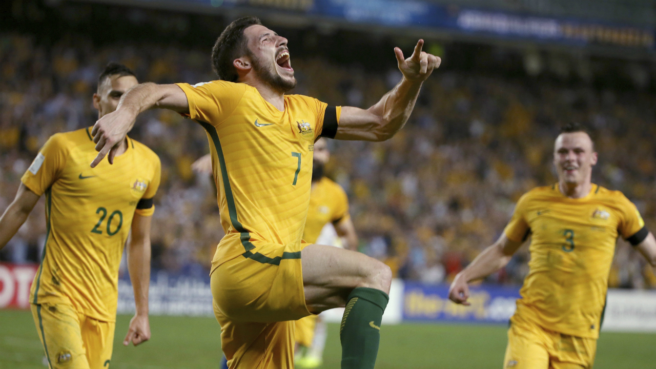 Australia's-Mathew-Leckie,-centre,-celebrates-scoring-against-the-United-Arab-Emirates-during-their-world-Cup-qualifying-soccer-match-in-Sydney,-Tuesday,-March-28,-2017.-(Rick-Rycroft/AP)