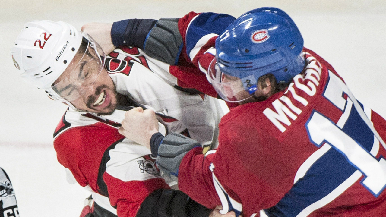 Montreal-Canadiens'-Torrey-Mitchell,-right,-fights-with-Ottawa-Senators'-Chris-Kelly-during-third-period-NHL-hockey-action-in-Montreal,-Sunday,-March-19,-2017.-(Graham-Hughes/CP)
