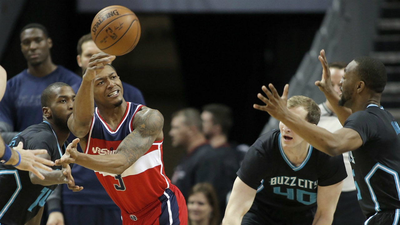 Washington-Wizards'-Bradley-Beal-(3)-gets-the-pass-away-from-the-defence-of-Charlotte-Hornets'-Michael-Kidd-Gilchrist,-left,-Cody-Zeller,-middle-and-Kemba-Walker,-right,-during-the-first-half-of-an-NBA-basketball-game-in-Charlotte,-N.C.,-Saturday,-March-18,-2017.-(Bob-Leverone/AP)