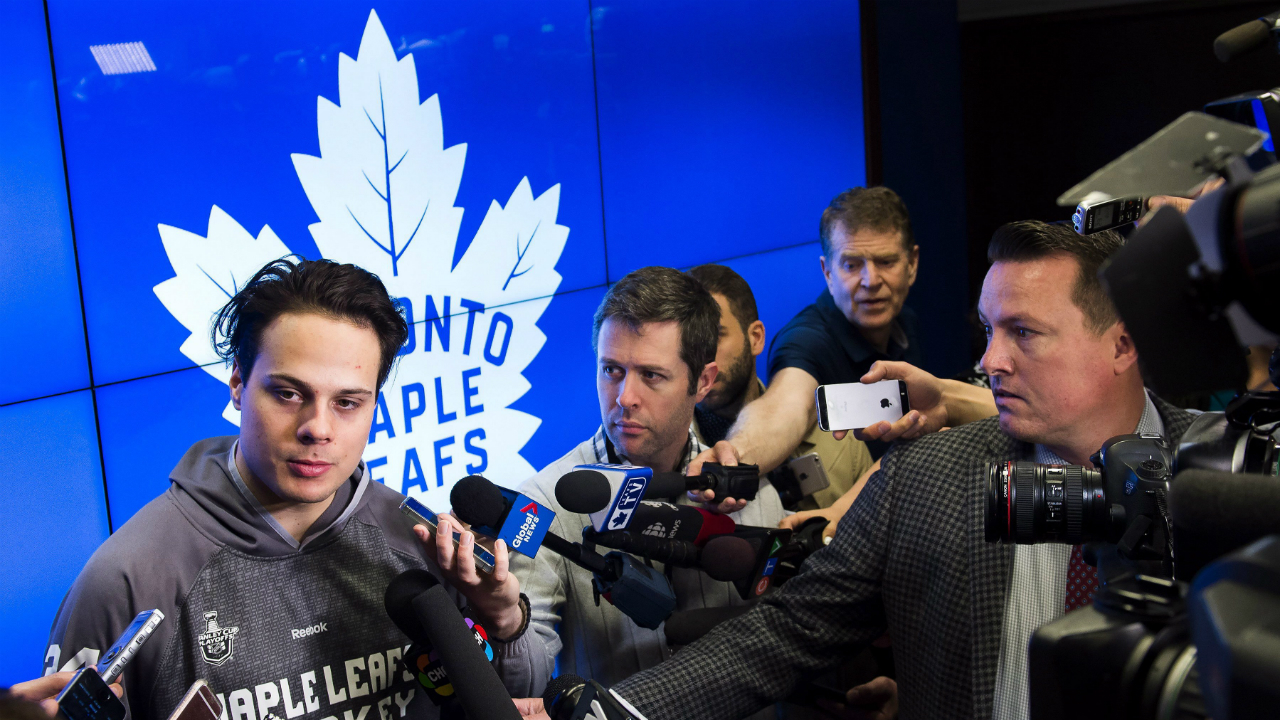 Toronto-Maple-Leafs-centre-Auston-Matthews,-left,-speaks-to-the-media-during-the-year-end-locker-room-clean-out-and-press-conference-in-Toronto-on-Tuesday,-April-25,-2017.-The-Maple-Leafs-were-eliminated-from-in-round-one-of-the-playoffs-by-the-Washington-Capitals-in-six-games.-(Nathan-Denette/CP)
