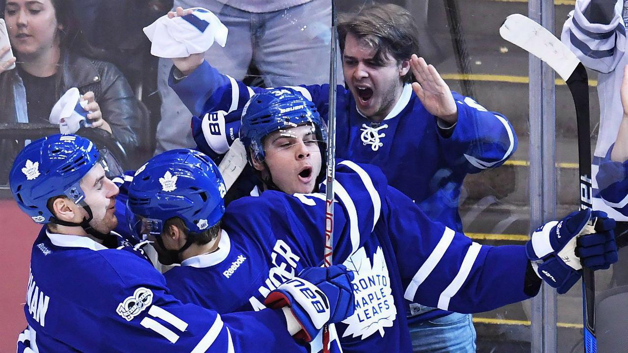 Toronto-Maple-Leafs-centre-Auston-Matthews-(34)-celebrates-his-goal-against-the-Washington-Capitals-with-Maple-Leafs-centre-Zach-Hyman-(11)-and-Maple-Leafs-right-wing-William-Nylander-(29)-during-first-period-NHL-hockey-round-one-playoff-action-in-Toronto-on-Monday,-April-17,-2017.-(Frank-Gunn/CP)