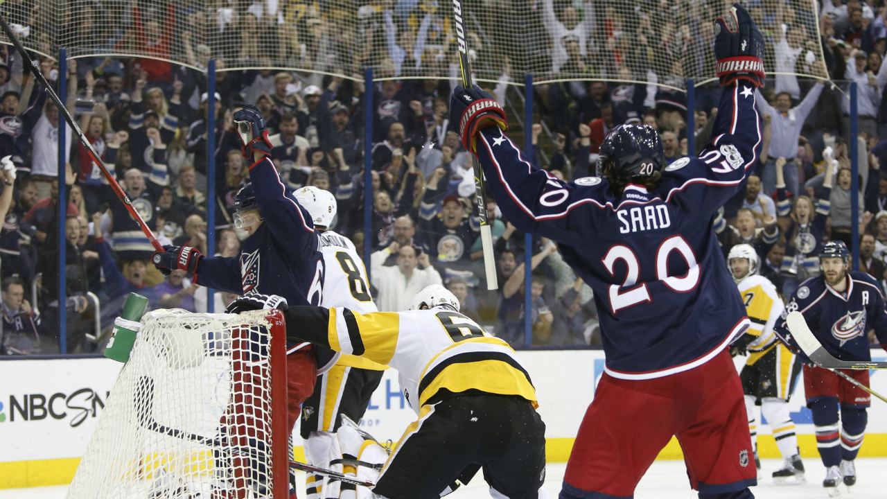 Columbus-Blue-Jackets'-Markus-Nutivaara,-left,-of-Finland,-and-Brandon-Saad-celebrate-a-goal-against-the-Pittsburgh-Penguins-during-the-second-period-of-Game-4-of-an-NHL-first-round-hockey-playoff-series-Tuesday,-April-18,-2017,-in-Columbus,-Ohio.-(Jay-LaPrete/AP)