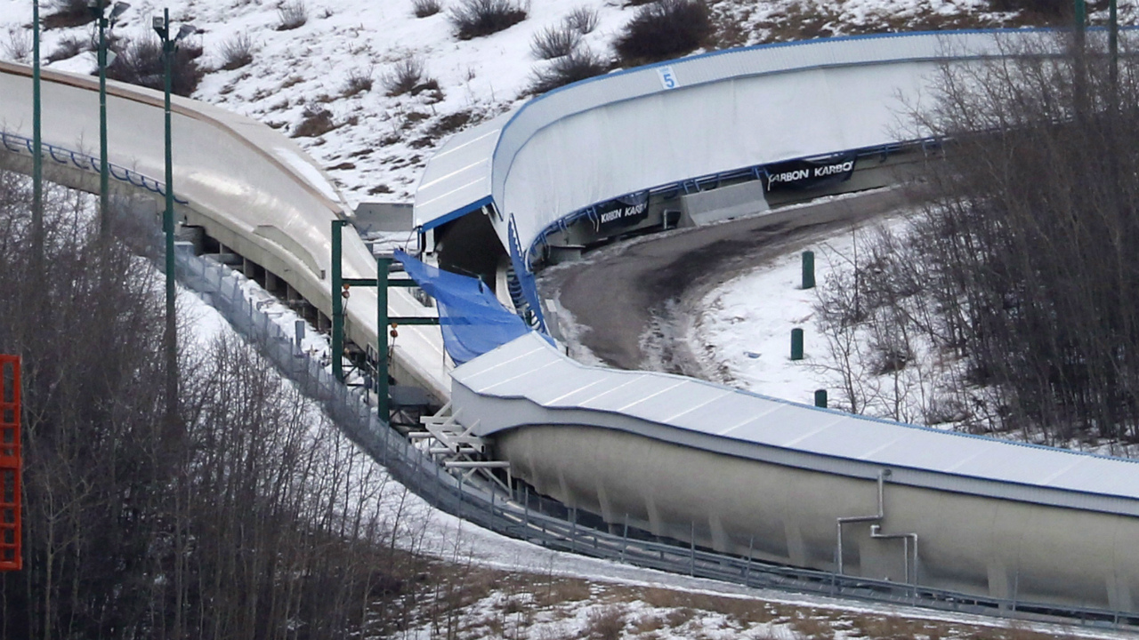 A-tarp-covers-the-intersection-of-the-bobsled-and-luge-tracks-at-Canada-Olympic-Park-in-Calgary.-(Larry-MacDougal/CP)