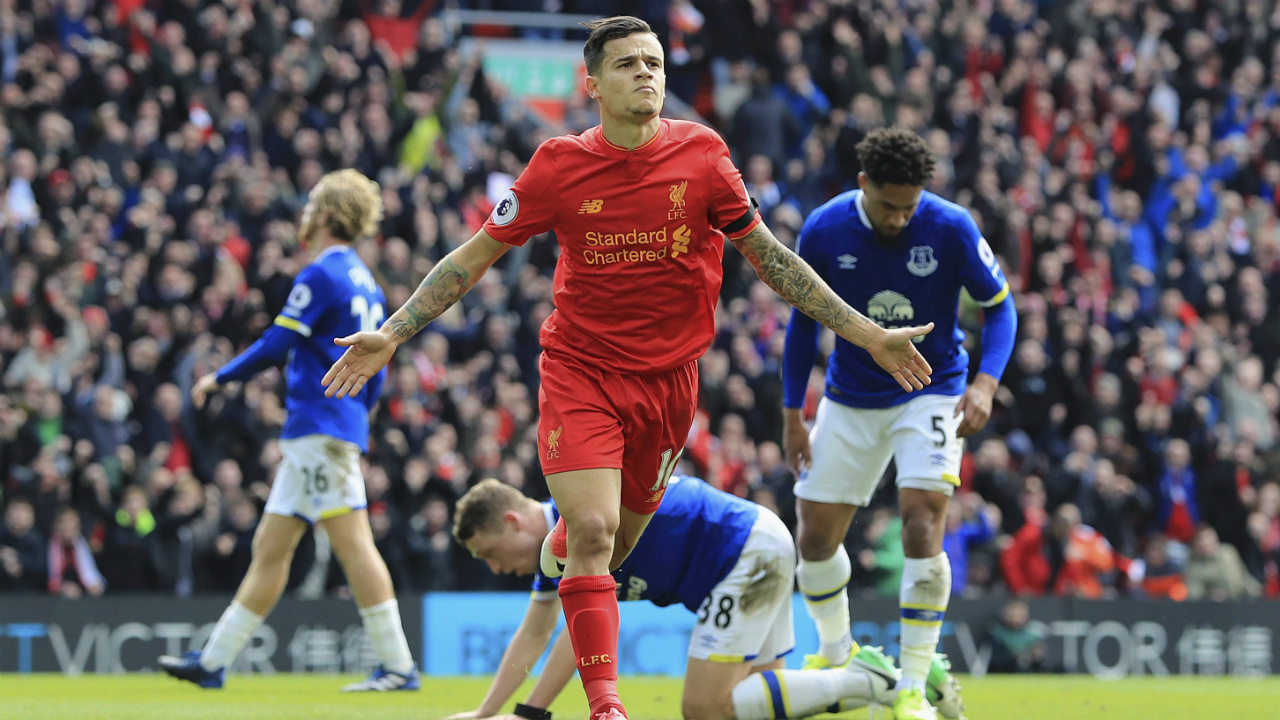 Liverpool's-Philippe-Coutinho-celebrates-scoring-his-side's-second-goal,-during-the-English-Premier-League-soccer-match-between-Liverpool-and-Everton,-at-Anfield,-in-Liverpool,-England,-Saturday-April-1,-2017.-(Peter-Byrne/PA-via-AP)