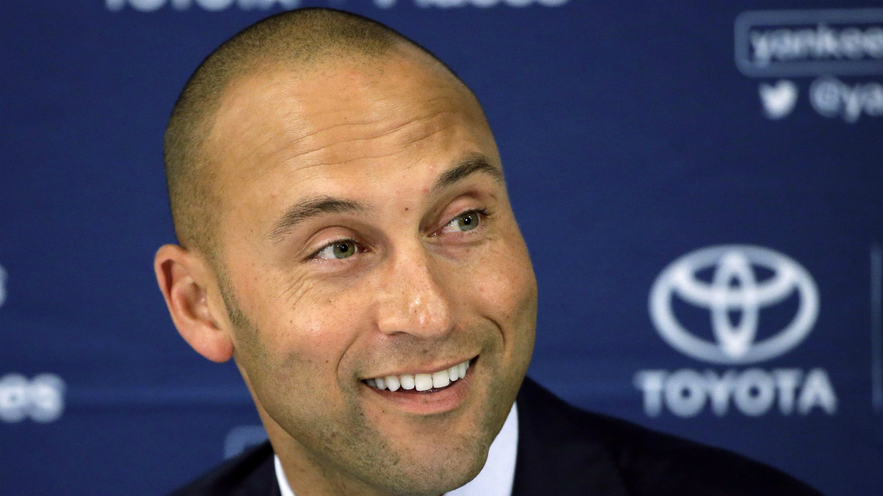 In-this-Sept.-28,-2014,-file-photo,-New-York-Yankees'-Derek-Jeter-speaks-to-the-media-after-the-last-baseball-game-of-his-career,-against-the-Boston-Red-Sox,-at-Fenway-Park-in-Boston.-A-person-familiar-with-the-situation-tells-The-Associated-Press-that-the-former-Yankees-star-Derek-Jeter-and-former-Florida-Gov.-Jeb-Bush-have-joined-forces-in-their-attempt-to-buy-the-Miami-Marlins.-The-person-confirmed-the-partnership-on-condition-of-anonymity-because-Jeter-and-Bush-have-not-commented-.(Steven-Senne,-File/AP)