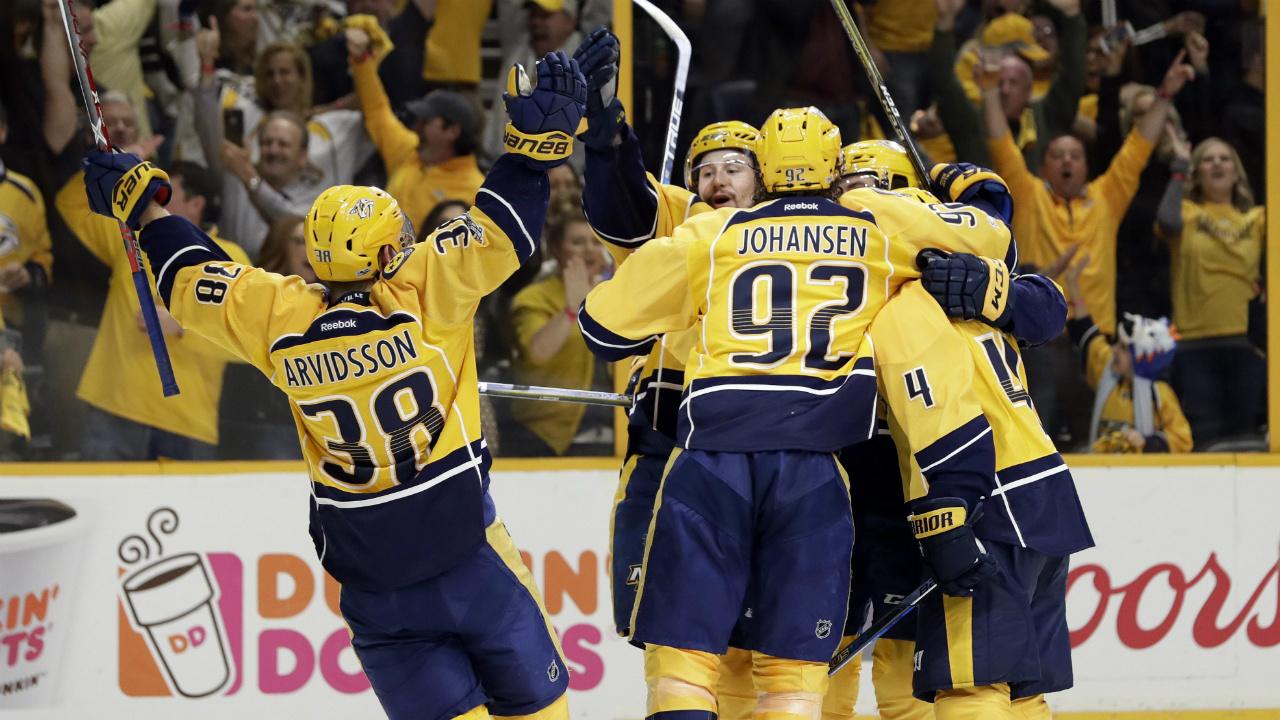 Nashville-Predators-players-celebrate-after-Roman-Josi-scored-a-goal-against-the-Chicago-Blackhawks-during-the-second-period-in-Game-4-of-a-first-round-NHL-hockey-playoff-series-Thursday,-April-20,-2017,-in-Nashville,-Tenn.-(Mark-Humphrey/AP)