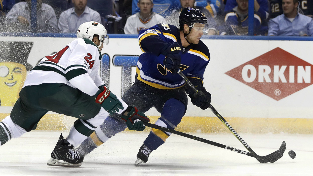 St.-Louis-Blues'-Jaden-Schwartz,-right,-looks-to-pass-as-Minnesota-Wild's-Matt-Dumba,-left,-watches-during-the-second-period-in-Game-3-of-an-NHL-hockey-first-round-playoff-series-Sunday,-April-16,-2017,-in-St.-Louis.-(Jeff-Roberson/AP)