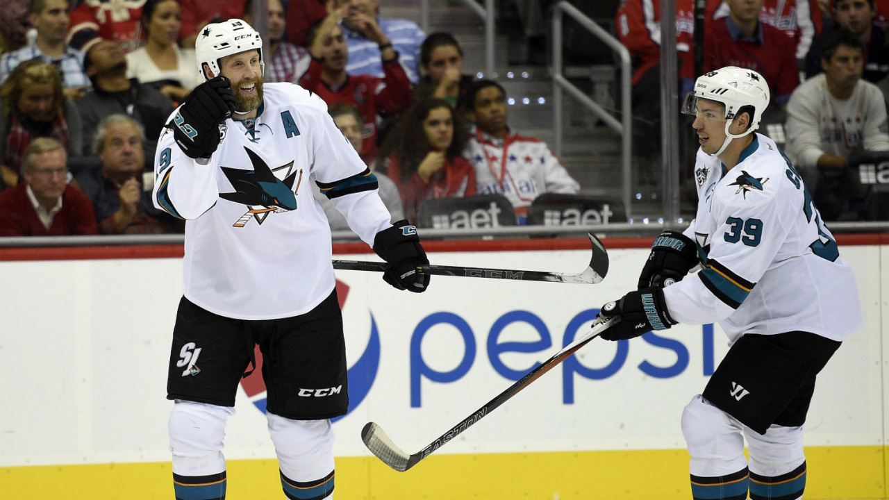 San-Jose-Sharks-centre-Joe-Thornton-(19)-celebrates-his-goal-with-Logan-Couture-(39).-(Nick-Wass/AP)