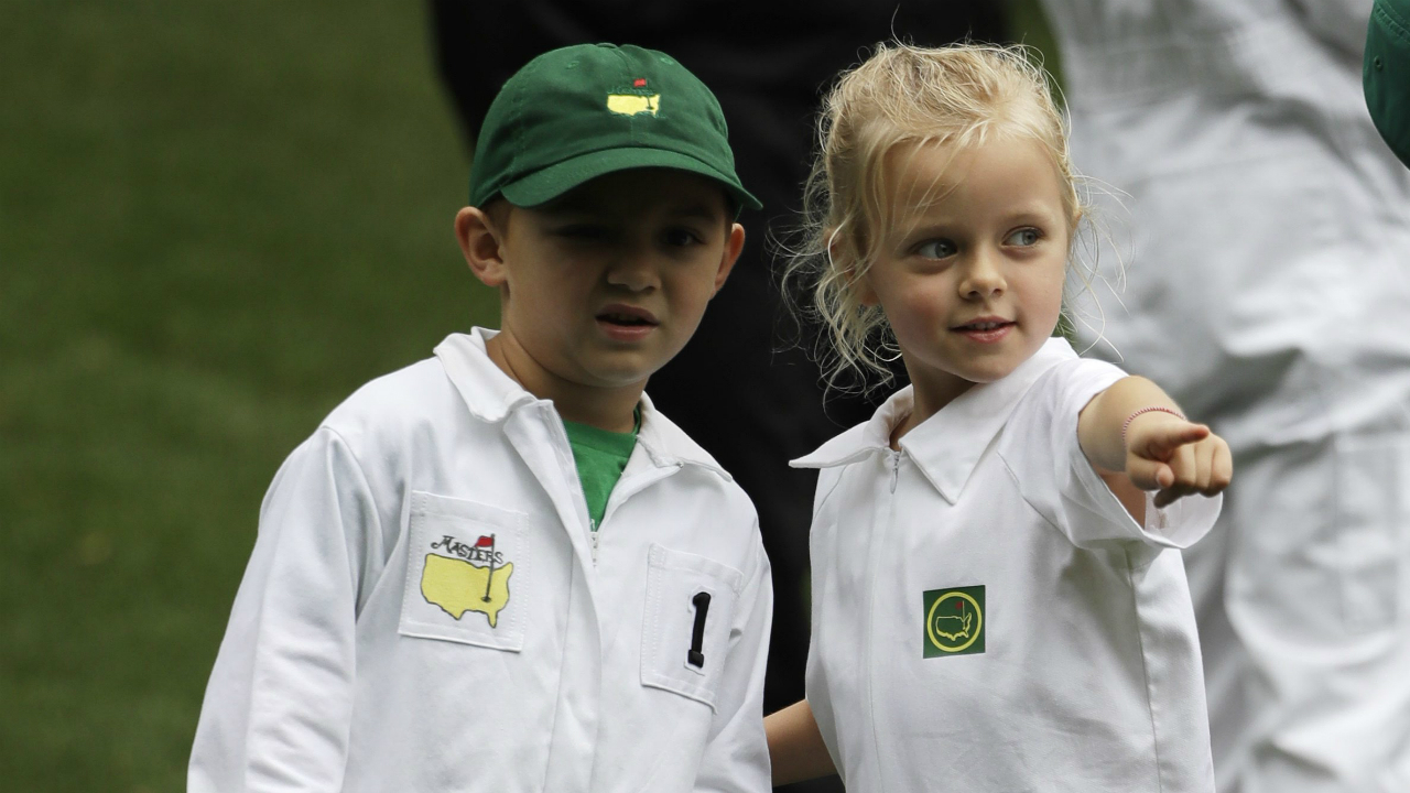 Caleb-Watson-and-Willow-Simpson-watch-their-fathers-Webb-Simpson-and-Bubba-Watson-play-during-the-par-three-competition-at-the-Masters-golf-tournament-Wednesday,-April-5,-2017,-in-Augusta,-Ga.-(David-J.-Phillip/AP)