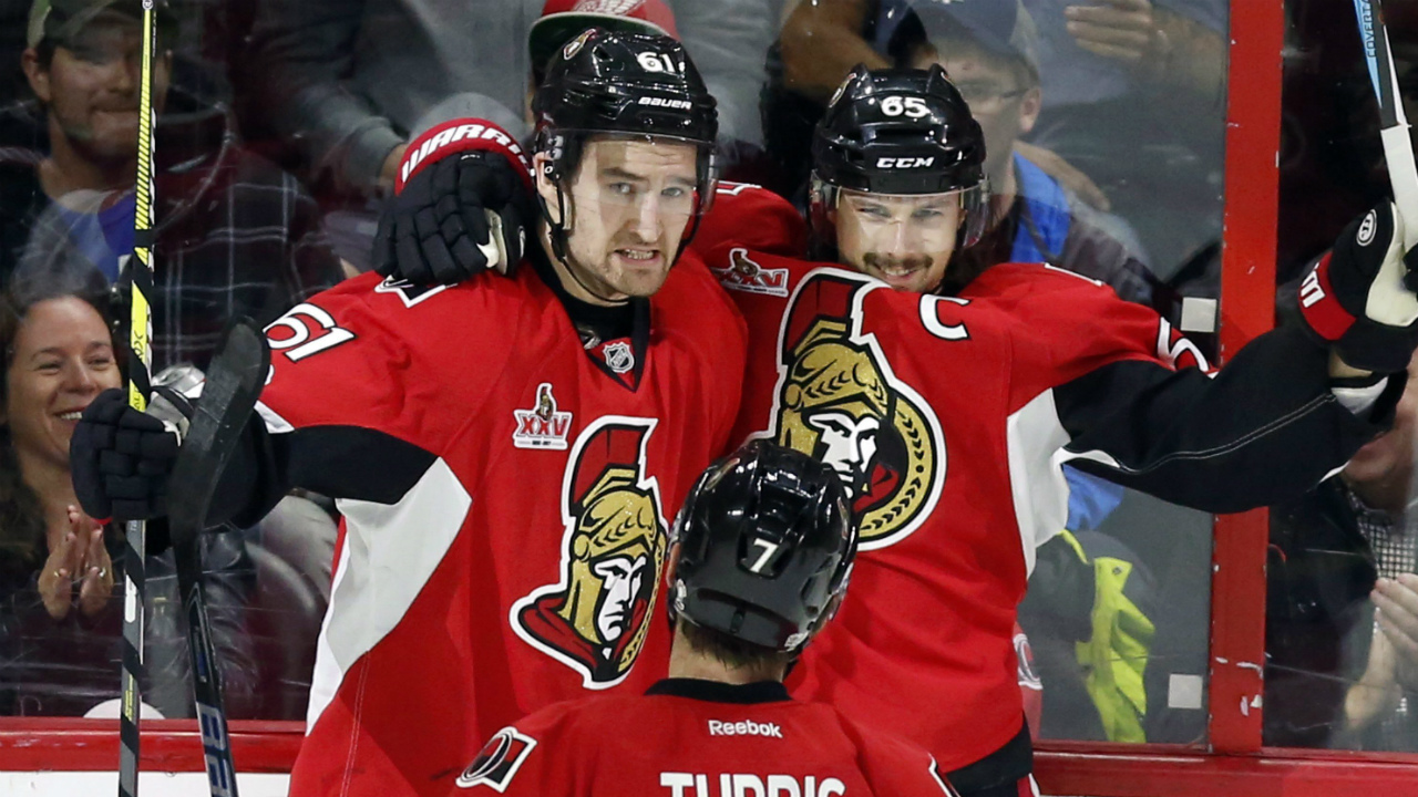 Ottawa-Senators'-Erik-Karlsson-(65)-celebrates-his-goal-with-teammates-Mark-Stone-(61)-and-Kyle-Turris-(7)-during-first-period-NHL-hockey-action-against-the-Detroit-Red-Wings,-in-Ottawa-on-Tuesday,-April-4,-2017.-(Fred-Chartrand/CP)