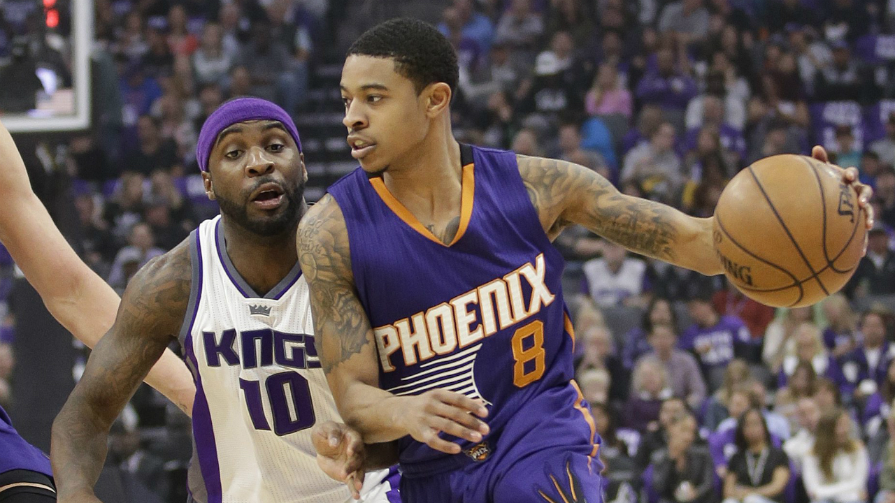 Phoenix-Suns-guard-Tyler-Ulis,-right,-drives-against-Sacramento-Kings-guard-Ty-Lawson-during-the-first-half-of-an-NBA-basketball-game-Tuesday,-April-11,-2017,-in-Sacramento,-Calif.-(Rich-Pedroncelli/AP)