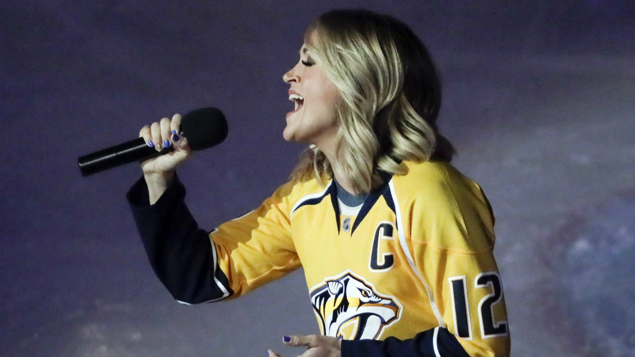 Country-music-star-Carrie-Underwood-performs-the-national-anthem-before-Game-3-of-a-first-round-NHL-hockey-playoff-series-between-the-Predators-and-the-Chicago-Blackhawks-Monday,-April-17,-2017,-in-Nashville,-Tenn.-(Mark-Humphrey/AP)