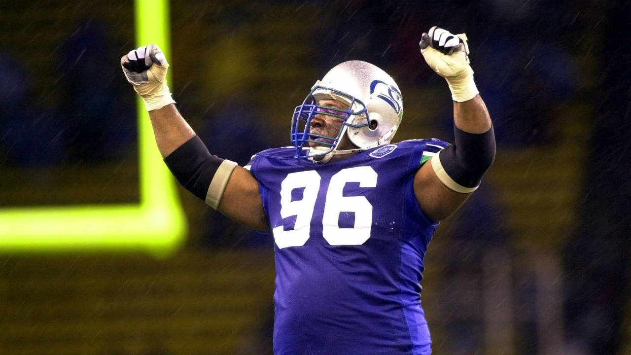 In-this-Dec.-16,-2000,-file-photo,-Seattle-Seahawks-defensive-tackle-Cortez-Kennedy-(96)-celebrates-Seattle's-27-24-victory-over-the-Oakland-Raiders-in-an-NFL-football-game-in-Seattle.-The-Orlando-Police-Department-confirmed-that-Kennedy-was-found-dead-Tuesday,-May-23,-2017,-in-Orlando.-(Cheryl-Hatch,-File/AP)