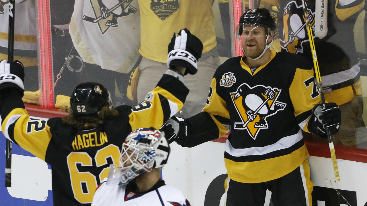 Pittsburgh-Penguins'-Patric-Hornqvist-(72)-celebrates-his-goal-past-Washington-Capitals-goalie-Braden-Holtby-(70)-with-Carl-Hagelin-(62)-during-the-first-period-of-Game-4-in-an-NHL-Stanley-Cup-Eastern-Conference-semifinal-hockey-game-in-Pittsburgh,-Wednesday,-May-3,-2017.-(Gene-J.-Puskar/AP)