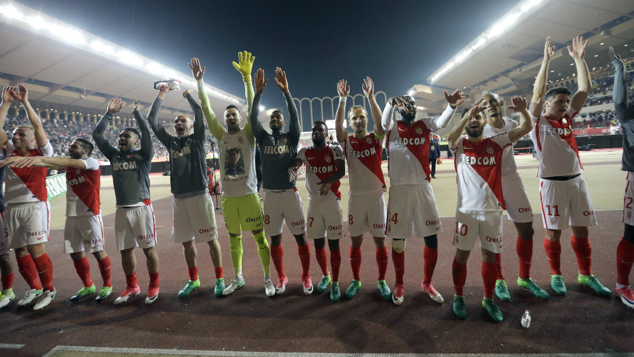 Monaco's-players-celebrate-after-defeating-Lille-during-a-League-One-soccer-match-between-Monaco-and-Lille,-at-the-Louis-II-stadium,-in-Monaco,-Sunday,-May,-14-2017.-(Claude-Paris/AP)
