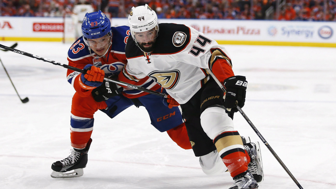 Anaheim-Ducks-centre-Nate-Thompson-(44)-protects-the-puck-from-Edmonton-Oilers-defenceman-Matthew-Benning-(83)-during-first-period-NHL-hockey-round-two-playoff-action-in-Edmonton-on-Wednesday,-May-3,-2017.-(Jeff-McIntosh/CP)