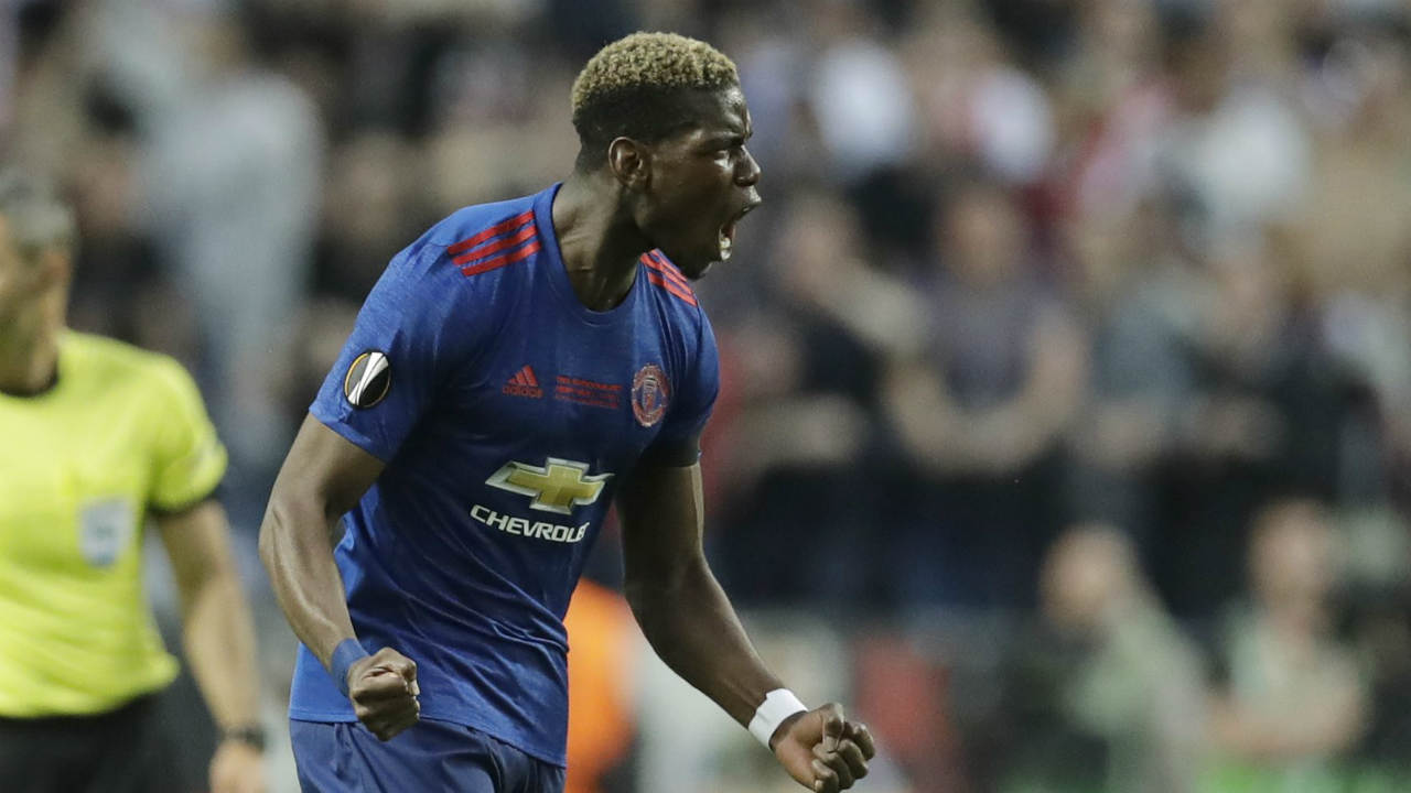 A-Wednesday,-May-24,-2017,-file-photo-of-Manchester's-Paul-Pogba-celebrating-after-scoring-the-opening-goal-during-the-soccer-Europa-League-final-between-Ajax-Amsterdam-and-Manchester-United-at-the-Friends-Arena-in-Stockholm,-Sweden.-Manchester-United-fears-it-will-lose-out-to-Real-Madrid-and-Barcelona-when-it-comes-to-signing-the-best-young-players-on-the-continent-after-Britain-leaves-the-European-Union.United-signed-a-16-year-old-Paul-Pogba-from-French-club-Le-Havre-in-2009.-(Michael-Sohn/AP)